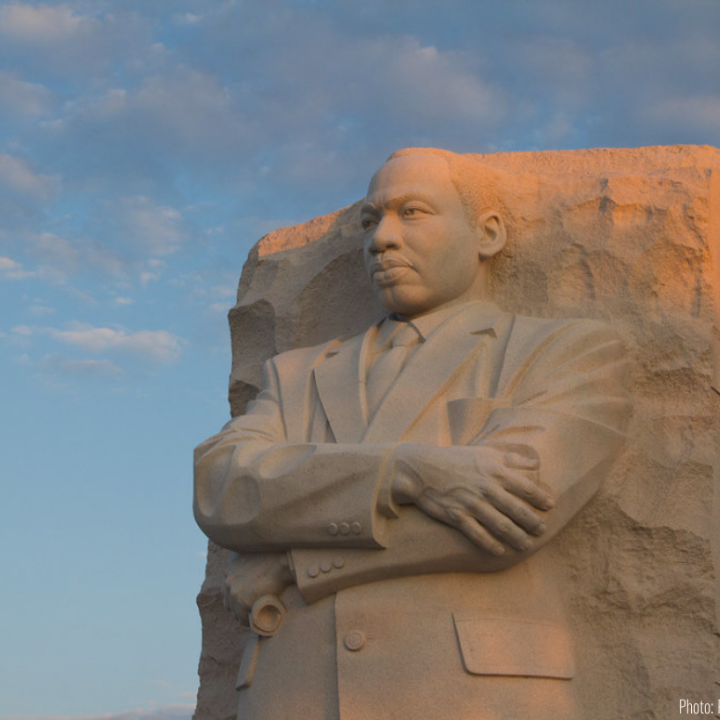 a statue of Dr. Martin Luther King Jr. in Washington DC at sunset